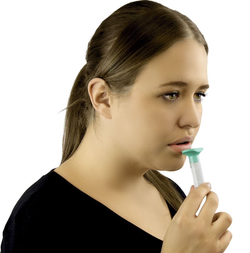 woman using Norgen's saliva collection and preservation device